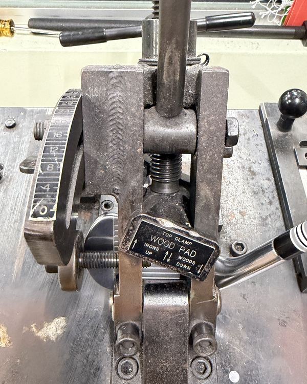A club clamped in the loft and lie machine, degree scale showing, in the White Plains shop